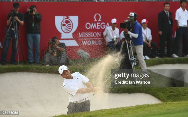 Francesco Molinari of Italy in action during the Foursome's on the second day of the Omega Mission Hills World Cup on the Olazabal course on November...