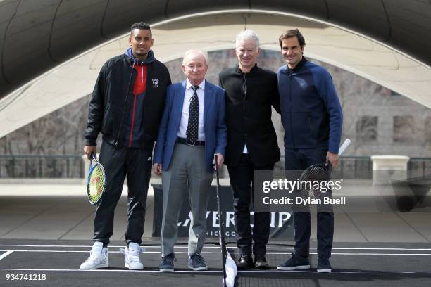 Nick Kyrgios of Australia, Rod Laver, John McEnroe, and Roger Federer of Switzerland pose for photos during the Laver Cup 2018 Chicago Launch at...