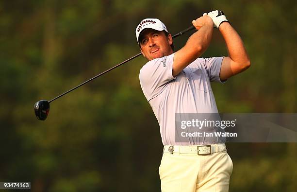 Graeme McDowell of Ireland in action during the Foursome's on the second day of the Omega Mission Hills World Cup on the Olazabal course on November...