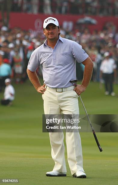 Graeme McDowell of Ireland looks on during the Foursome's on the second day of the Omega Mission Hills World Cup on the Olazabal course on November...