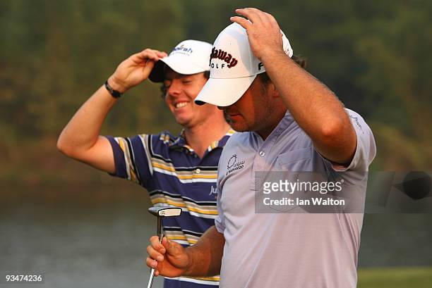 Graeme McDowell and Rory McIlroy of Ireland during the Foursome's on the second day of the Omega Mission Hills World Cup on the Olazabal course on...