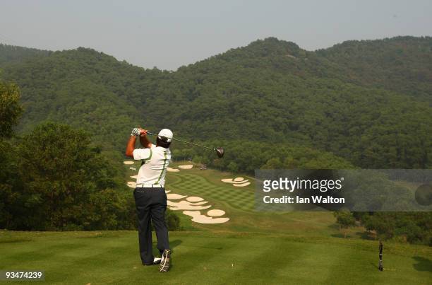 Francesco Molinari of Italy in action during the Foursome's on the second day of the Omega Mission Hills World Cup on the Olazabal course on November...