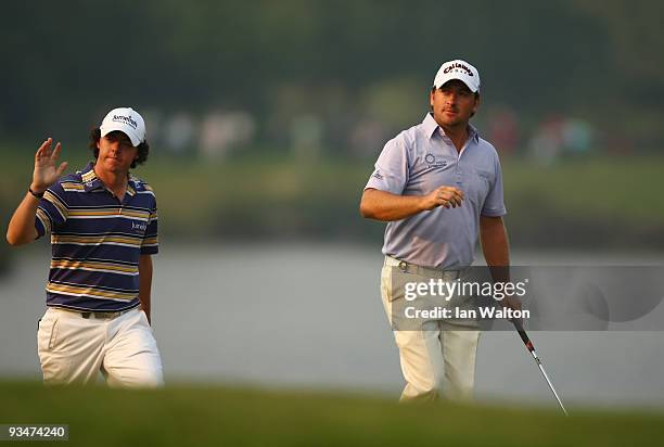 Graeme McDowell and Rory McIlroy of Ireland during the Foursome's on the second day of the Omega Mission Hills World Cup on the Olazabal course on...