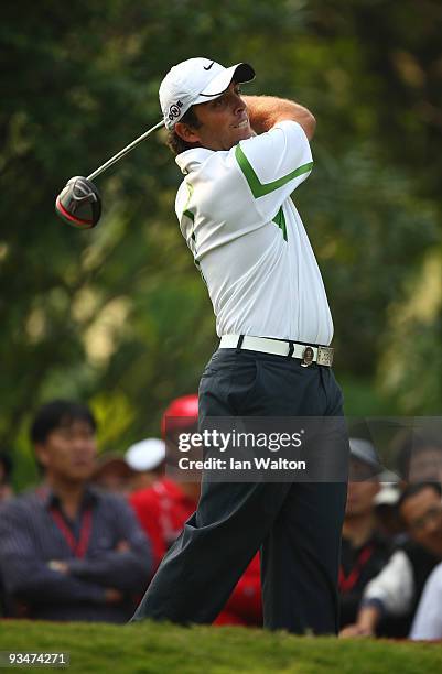 Francesco Molinari of Italy in action during the Foursome's on the second day of the Omega Mission Hills World Cup on the Olazabal course on November...