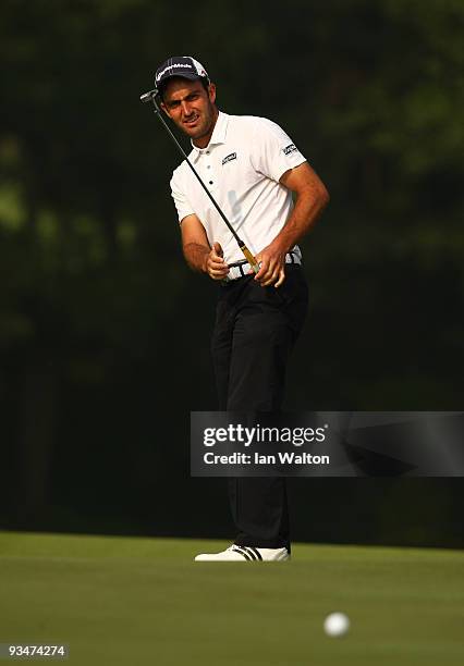 Edoardo Molinari of Italy in action during the Foursome's on the second day of the Omega Mission Hills World Cup on the Olazabal course on November...