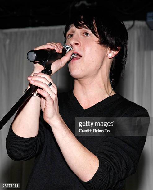 Mitchel Musso performs at the "Holiday Of Hope" Tree-Lighting Celebration And Benefit at Hollywood & Highland Courtyard on November 28, 2009 in...