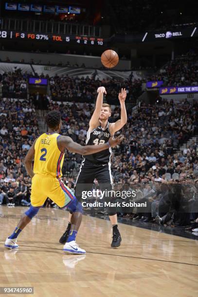 Davis Bertans of the San Antonio Spurs passes the ball against the Golden State Warriors on March 19, 2018 at the AT&T Center in San Antonio, Texas....