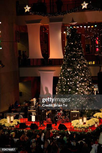 Paul McGill and Jonathan Bennett speak at the "Holiday Of Hope" Tree-Lighting Celebration And Benefit at Hollywood & Highland Courtyard on November...