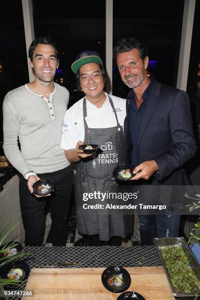 Jeremy Chardy poses with Chef Diego Oka at the Citi Taste Of Tennis Miami 2018 at W Miami on March 19, 2018 in Miami, Florida.