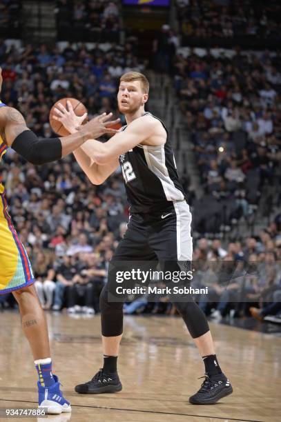 Davis Bertans of the San Antonio Spurs handles the ball against the Golden State Warriors on March 19, 2018 at the AT&T Center in San Antonio, Texas....