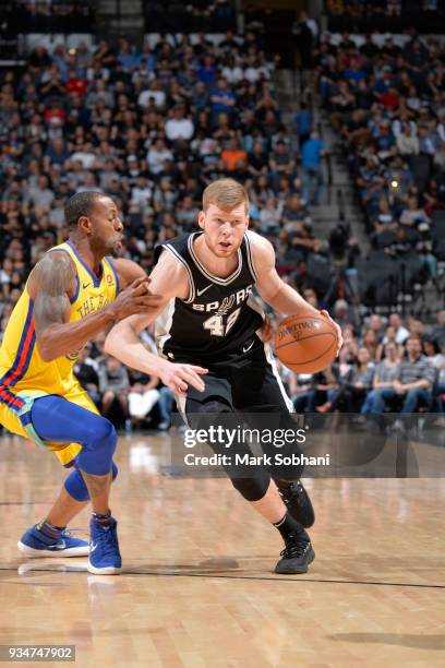 Davis Bertans of the San Antonio Spurs handles the ball against the Golden State Warriors on March 19, 2018 at the AT&T Center in San Antonio, Texas....