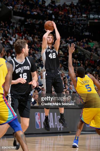 Davis Bertans of the San Antonio Spurs shoots the ball against the Golden State Warriors on March 19, 2018 at the AT&T Center in San Antonio, Texas....