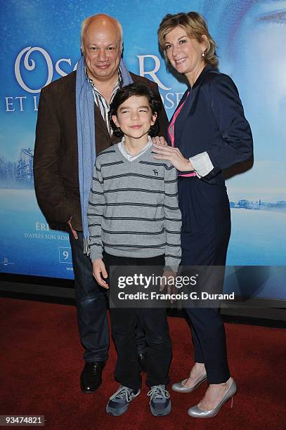 Director Eric-Emmanuel Schmitt , french actress Michele Laroque and young actor Amir Ben Abdelmoumen pose as they attend Oscar et La Dame Rose Paris...