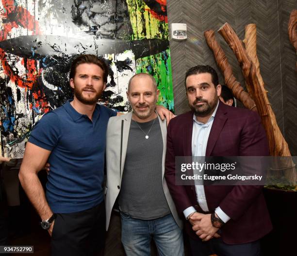 Scott Eastwood, Paul Gerbin, and Seth SemilofÊ attend the Haute Living And Louis XIII Celebration of Scott Eastwood At Scarpetta NYC on March 19,...