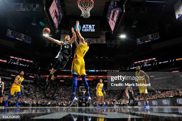 Davis Bertans of the San Antonio Spurs handles the ball against the Golden State Warriors on March 19, 2018 at the AT&T Center in San Antonio, Texas....