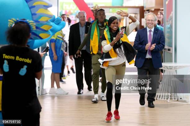 Elaine Thompson and Julian Forte of the Jamaican 2018 Commonwealth Games team arrive with Chairman Peter Beattie and CEO Mark Peters at the Gold...