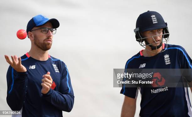 England captain Joe Root chats with the recently arrived bowler Jack Leach during England nets at Eden Park on March 20, 2018 in Auckland, New...