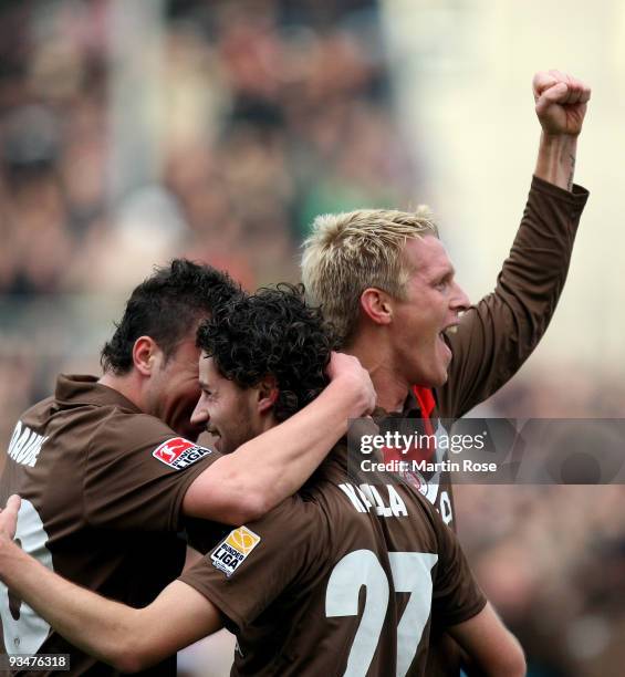 Marius Ebbers of St. Pauli celebrates with his team mates his team's 2nd goal during the Second Bundesliga match between FC St. Pauli and Union...