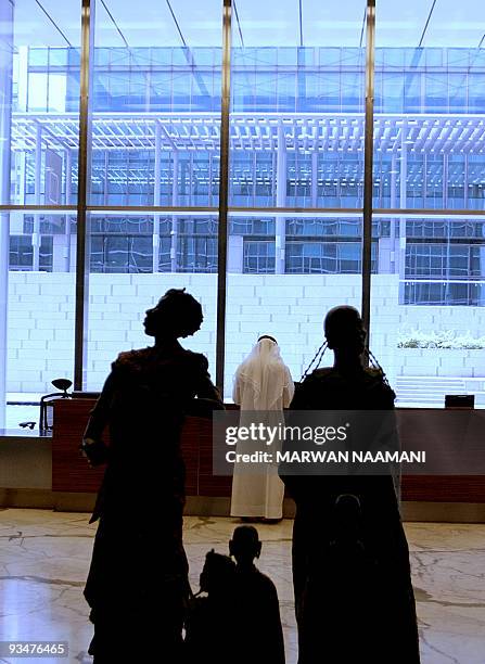 Sculptures in the Dubai International Financial Centre , "The Gate", pictured on July 10, 2008 is the first building in the Dubai Financial District...