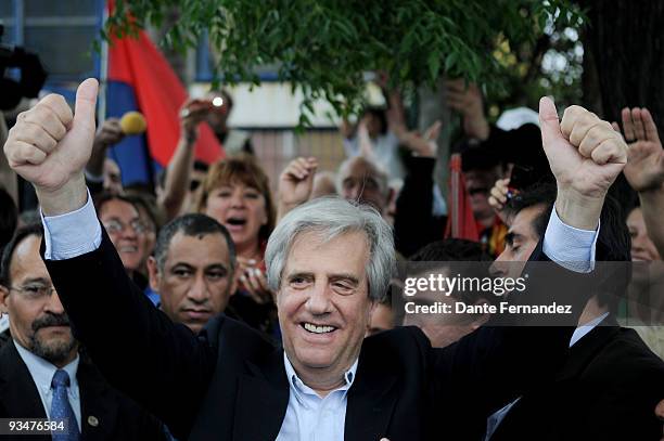 Uruguay's president Tabare Vazquez waves to supporters after casting his vote in the Uruguayan run-off presidential elections on November 29, 2009 in...