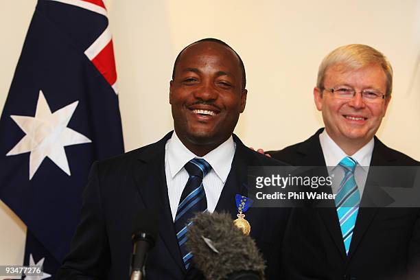 Former West Indies cricketer Brian Lara speaks after being presented with the insignia of the Order of Australia by Australian Prime Minister Kevin...