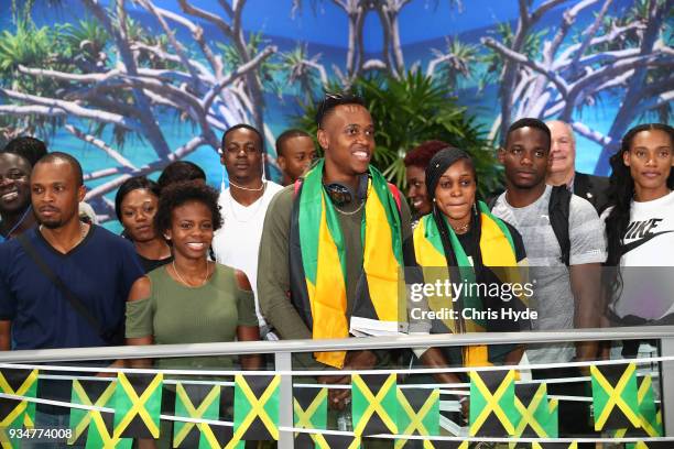 Elaine Thompson and Julian Forte and the Jamaican 2018 Commonwealth Games team arrive at the Gold Coast Airport on March 20, 2018 in Gold Coast,...