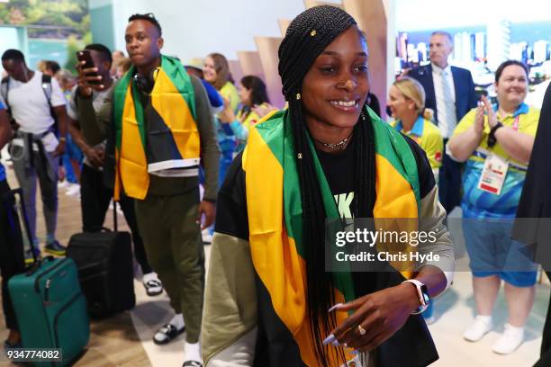 Elaine Thompson and Julian Forte of the Jamaican 2018 Commonwealth Games team arrive at the Gold Coast Airport on March 20, 2018 in Gold Coast,...