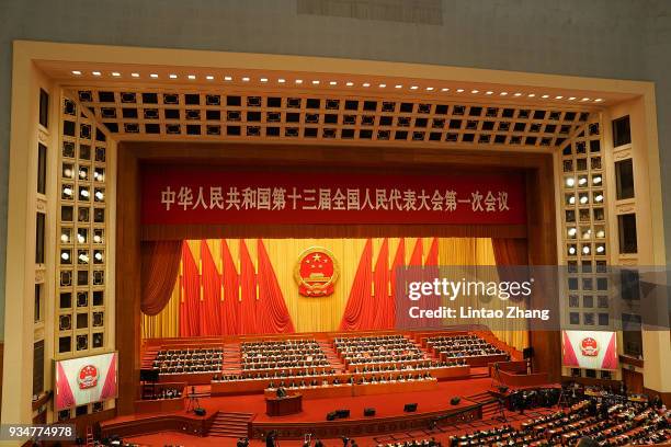 Chinese President Xi Jinping delivers a speech during the closing session of the National People's Congress at the Great Hall of the People on March...