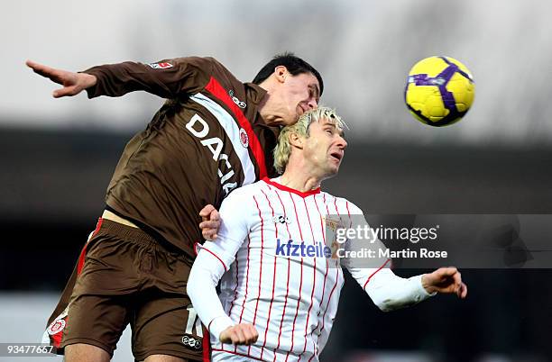 Ralph Gunesch of St. Pauli and Bjoern Brunnemann of Berlin battle for the ball during the Second Bundesliga match between FC St. Pauli and Union...