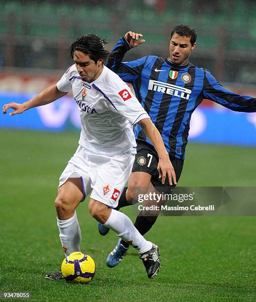 Ricardo Quaresma of FC Inter Milan battles for the ball against Juan Manuel Vargas of ACF Fiorentina during the Serie A match between FC Inter Milan...