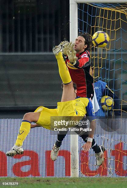 Goalkeeper Salvatore Sirigu of Palermo fails to stop Elvis Abbruscato of Chievo scoring the opening goal during the Serie A match between AC Chievo...