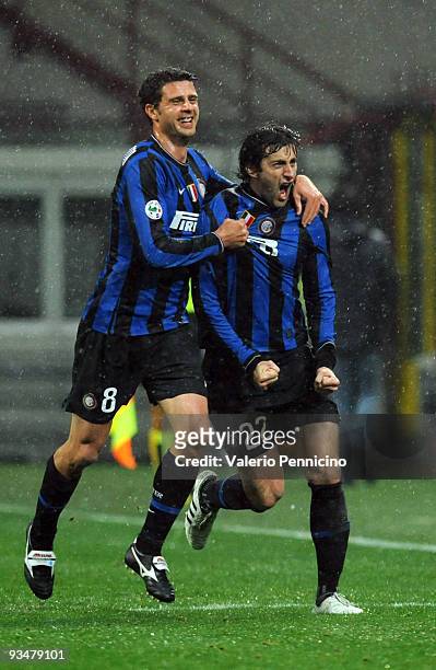Diego Milito with Thiago Motta of FC Internazionale celebrate his goal during the Serie A match between Inter Milan and Fiorentina at Stadio Giuseppe...