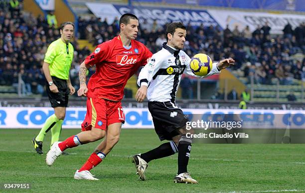 Francesco Lunardini of Parma FC competes for the ball with Marek Hamsik of SSC Napoli during the Serie A match between Parma and Napoli at Stadio...