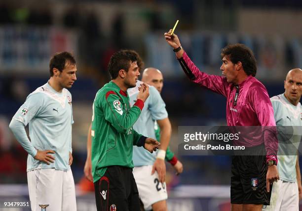 Referee Bergonzoni shows the yellow card to Stefan Radu of SS Lazio and to Pablo Daniel Osvaldo of Bologna during the Serie A match between SS Lazio...