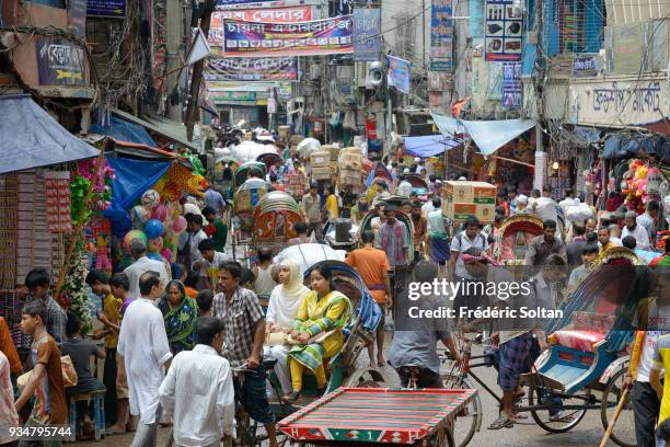 The capital city of Dhaka. The neighbourhood of Sadarghat, in the old city of Dhaka, the capital of Bangladesh in June 15, 2015 in Dhaka, Bangladesh