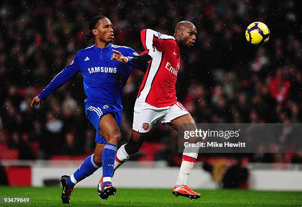 William Gallas of Arsenal challenges Didier Drogba of Chelsea during the Barclays Premier League match between Arsenal and Chelsea at the Emirates...