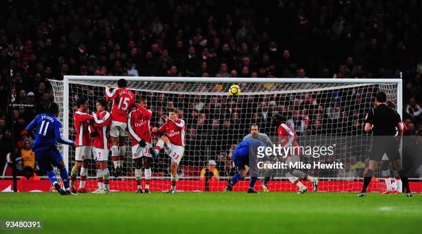 Didier Drogba of Chelsea scores his second goal during the Barclays Premier League match between Arsenal and Chelsea at the Emirates Stadium on...