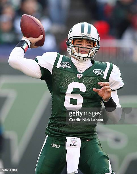 Mark Sanchez of the New York Jets drops back to pass against the Carolina Panthers at Giants Stadium on November 29, 2009 in East Rutherford, New...