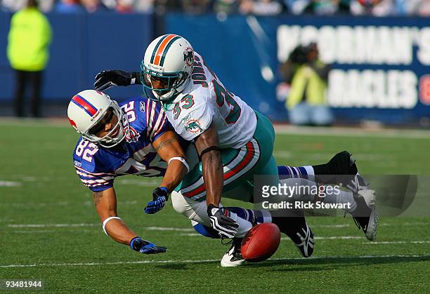 Nathan Jones of the Miami Dolphins deflects a pass intended for Josh Reed of the Buffalo Bills at Ralph Wilson Stadium on November 29, 2009 in...