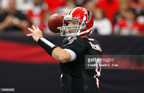 Quarterback Chris Redman of the Atlanta Falcons steps back in the pocket against the Tampa Bay Buccaneers at Georgia Dome on November 29, 2009 in...