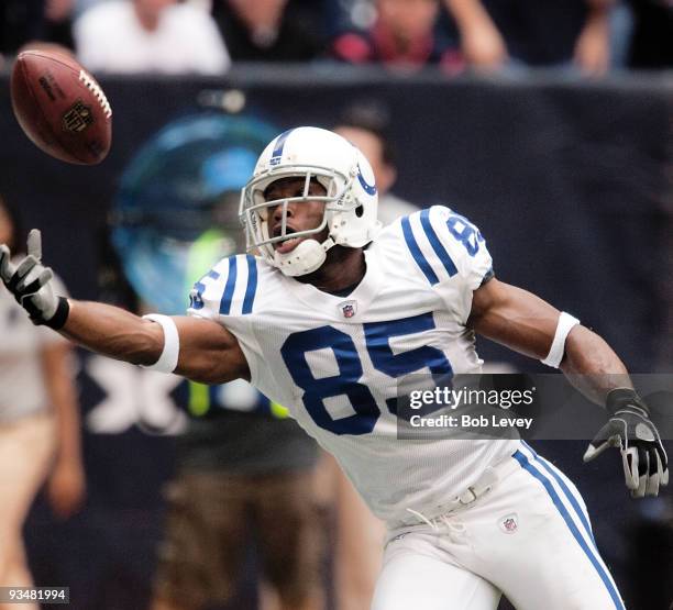 Wide receiver Pierre Garcon of the Indianapolis Colts makes a one-handed catch in the end-zone for a touchdown against the Houston Texans at Reliant...