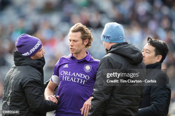 March 11: Jonathan Spector of Orlando City is treated by medical staff after a head clash during the New York City FC Vs Orlando City SC regular...