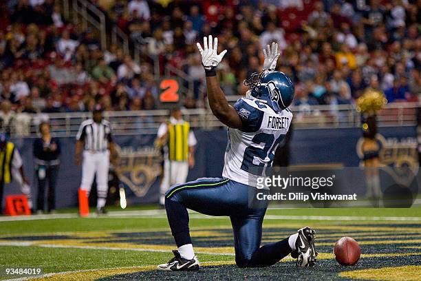 Justin Forsett of the Seattle Seahawks celebrates a touchdown against the St. Louis Rams at the Edward Jones Dome on November 29, 2009 in St. Louis,...