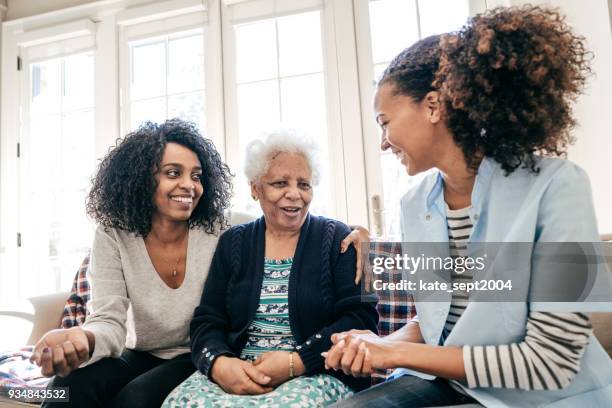 assisted living center - three female doctors stock pictures, royalty-free photos & images