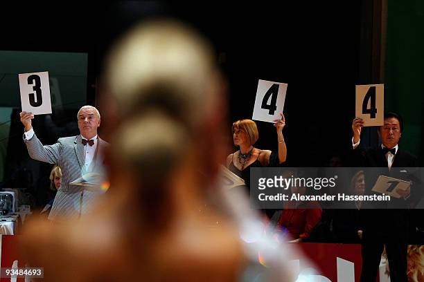 Judges vote during the World Latin Dance Masters 2009 at the Innsbruck Congress hall on November 28, 2009 in Innsbruck, Austria.