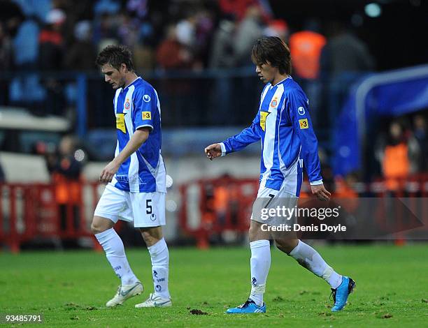 Shunsuke Nakamura and Ivan Pillud of Espanyol leave the field after losing 4-0 to Atletico Madrid in the La Liga match between Espanyol and Atletico...