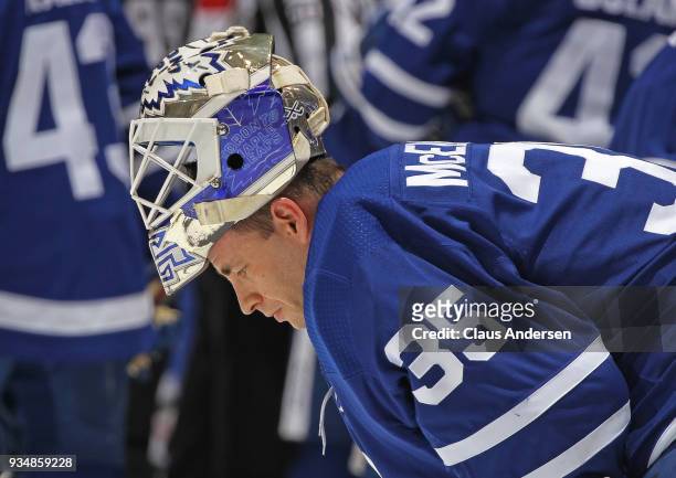 Curtis McElhinney of the Toronto Maple Leafs takes a breather against the Montreal Canadiens during an NHL game at the Air Canada Centre on March 17,...