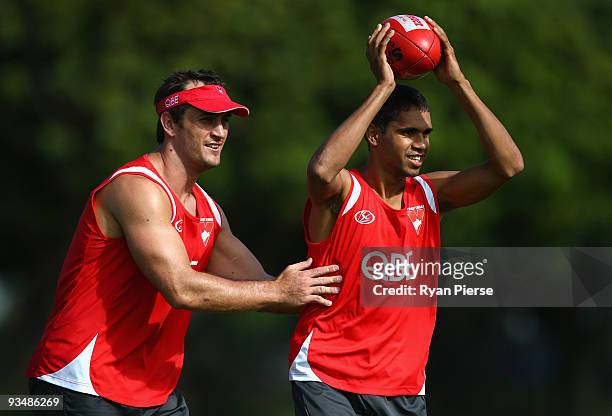 Lewis Jetta , a new recruit of the Swans, and Daniel Bradshaw of the Swans in action during a Sydney Swans Training Session at Lakeside Oval on...