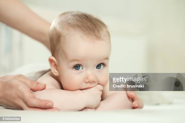 mother with a small child - blonde hair blue eyes stock pictures, royalty-free photos & images