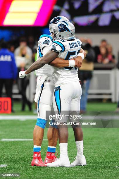 Cam Newton and Thomas Davis of the Carolina Panthers prior to the game against the Atlanta Falcons at Mercedes-Benz Stadium on December 31, 2017 in...